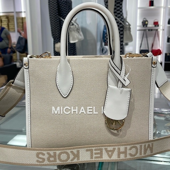 Michael Kors Handbags - Michael Kors Mirella Small Shopper Top Zip Logo Crossbody XBODY
Optic White 
NW